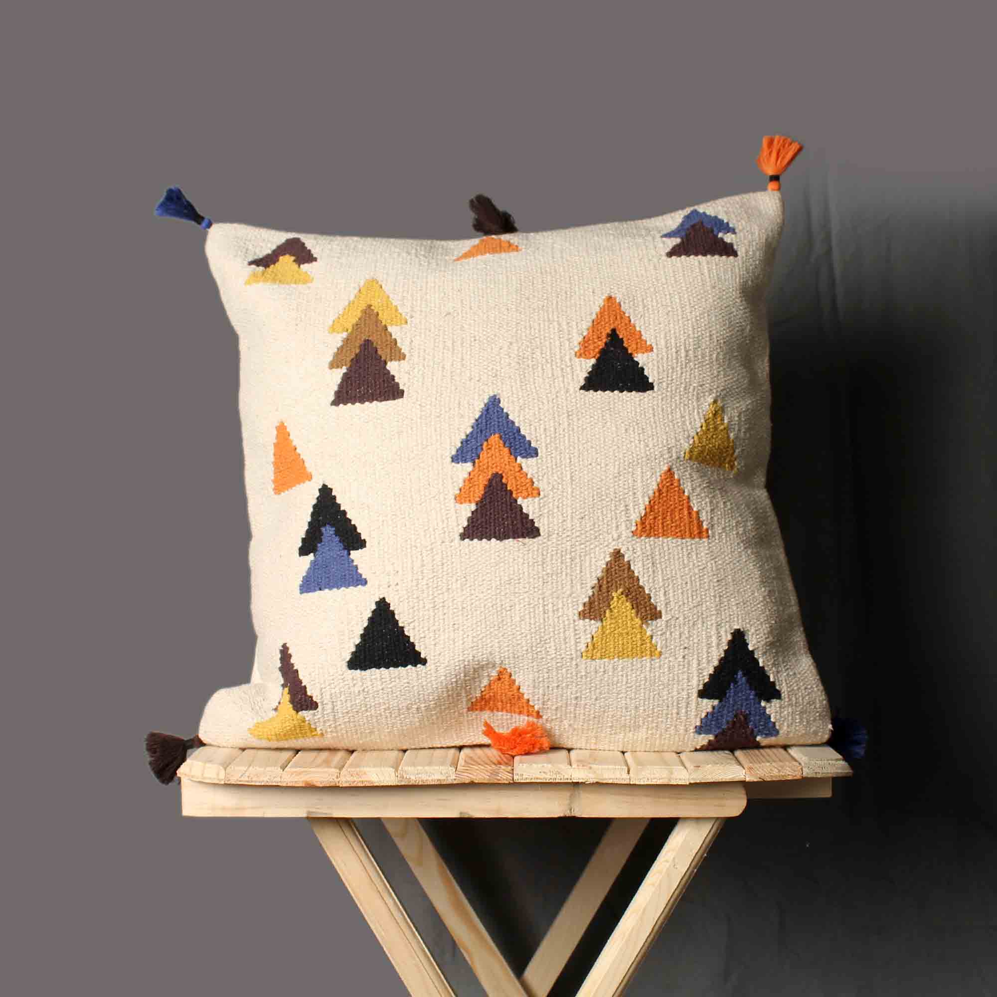 Multi-color Set of 4 Cushion Covers with tassals.