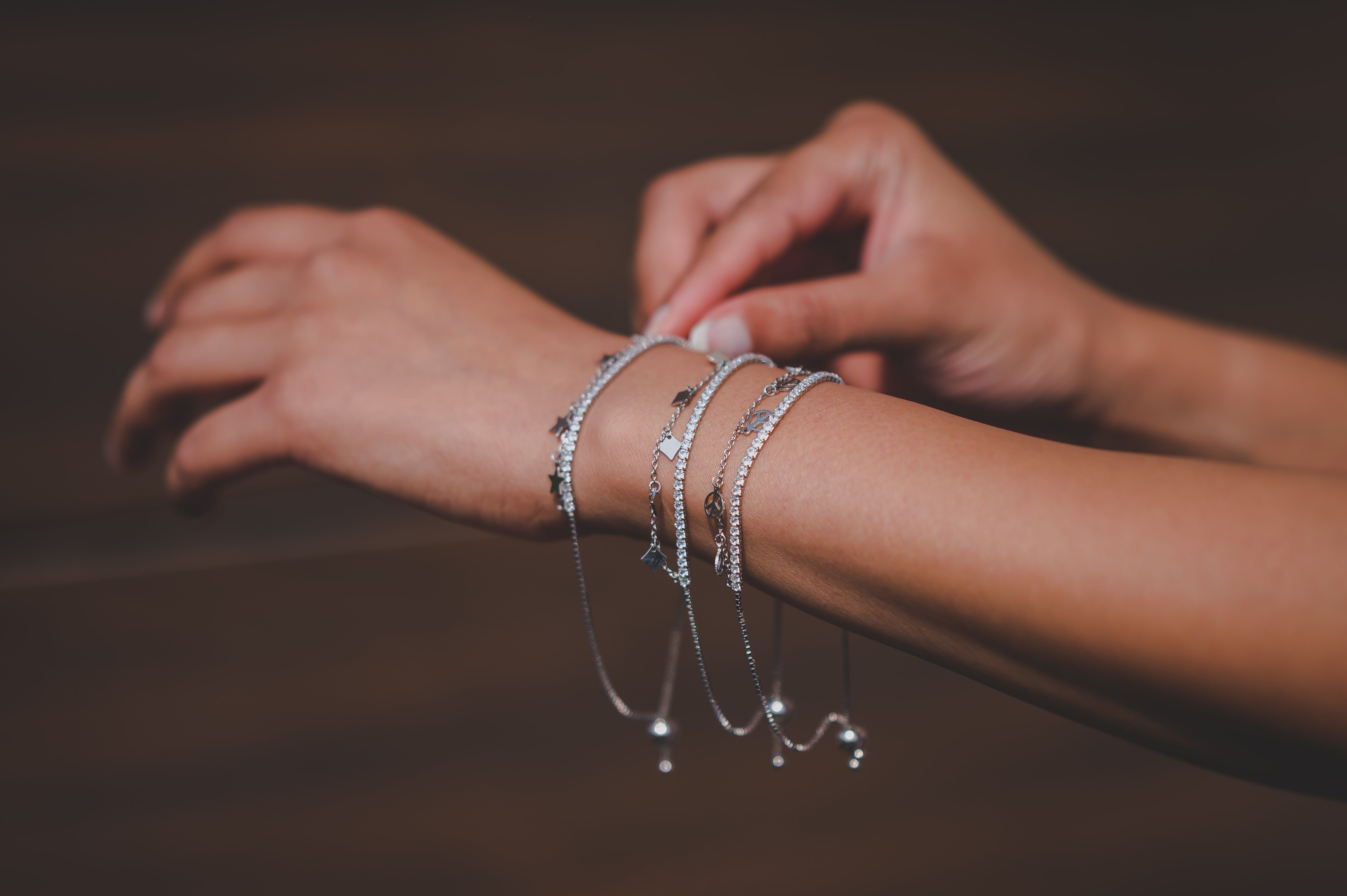 Tennis Bracelet Attached with Peace Charms